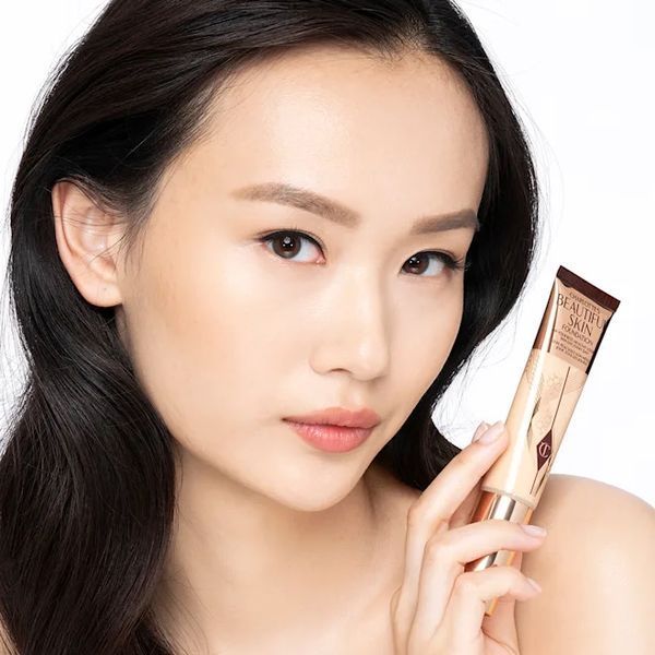 Тональна основа Charlotte Tilbury Beautiful Skin Foundation, відтінок 2 Warm SP-10-2 фото